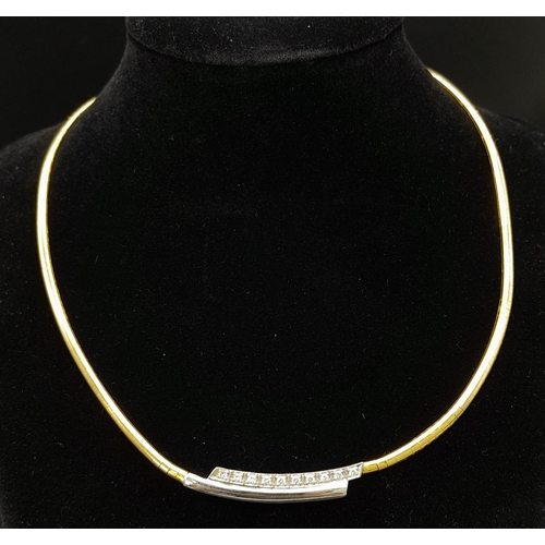 92 - An 18K Yellow Gold and Diamond Choker Necklace. Rich yellow gold gives way to ten quality round cut ... 