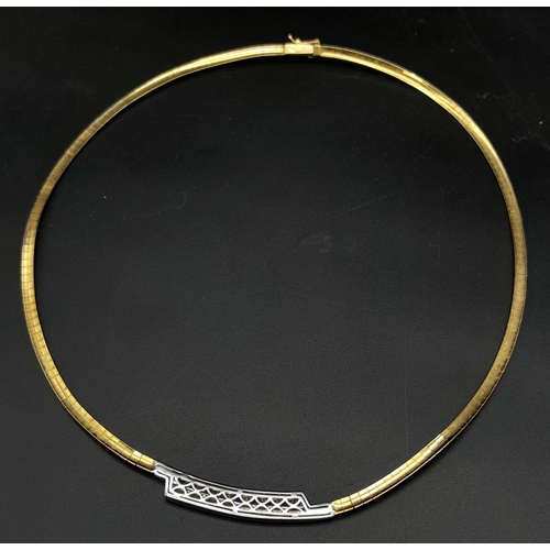 92 - An 18K Yellow Gold and Diamond Choker Necklace. Rich yellow gold gives way to ten quality round cut ... 