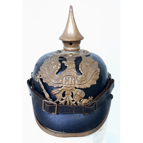 20 - WW1 1895 Model Imperial German Pickelhaube with chinstrap and cockles. Unit marked to the 70 th (Rhe... 