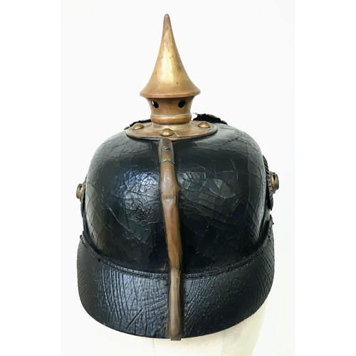 20 - WW1 1895 Model Imperial German Pickelhaube with chinstrap and cockles. Unit marked to the 70 th (Rhe... 