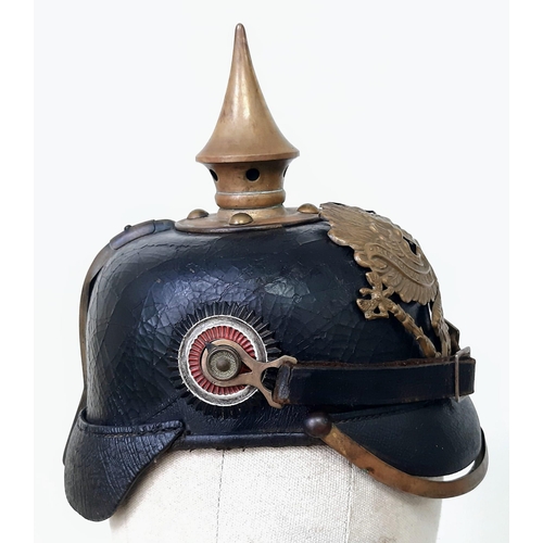 20 - WW1 1895 Model Imperial German Pickelhaube with chinstrap and cockles. Unit marked to the 70 th (Rhe... 