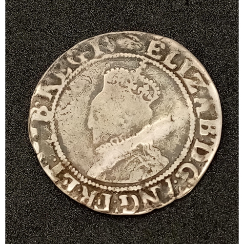 221 - A 1590-1592 Elizabeth I Silver Hammered Shilling, mm. Hand. Please see photos for conditions.