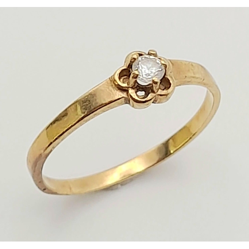 296 - Two 9 K yellow gold rings with cubic zirconia, size: J, total weight: 1.6 g.