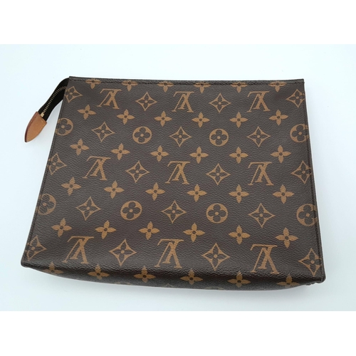 101 - The LOUIS VUITTON Toiletry 26 Zip Pouch in Monogram. Golden-tone zip closure with leather tab. Inter... 