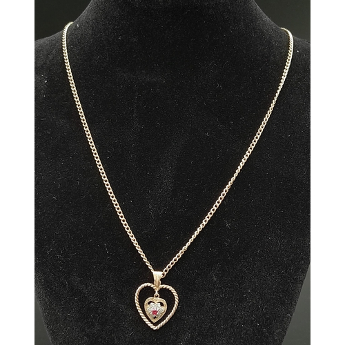 Sold at Auction: A 9K Yellow Gold Heart Locket Pendant on a 9K