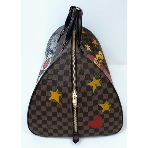 23 - A Rare Louis Vuitton 'Tweedy Pie' Speedy Luggage Bag. Checked LV canvas exterior with Tweedy Pie dec... 