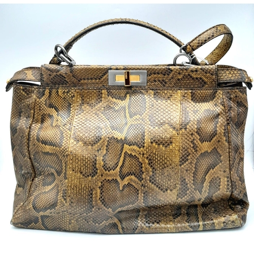 69 - A Large Fendi Brown Python Peekaboo Handle Bag. Come with an internal zipped pocket and double twist... 