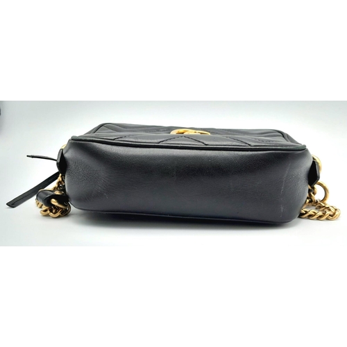 90 - A Black GUCCI GG Marmont Matelasse Mini Leather Crossbody bag. Come with gold-tone hardware and Inte... 