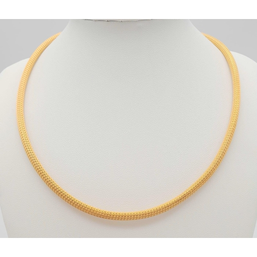 128 - A 18K Yellow Gold Woven Fox-Tail Necklace. 44cm length. 23.2g weight.