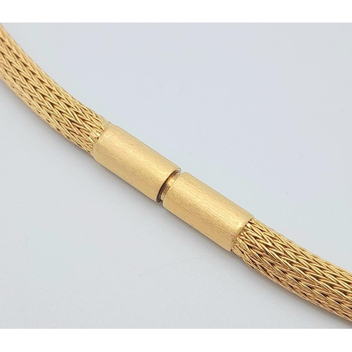 128 - A 18K Yellow Gold Woven Fox-Tail Necklace. 44cm length. 23.2g weight.