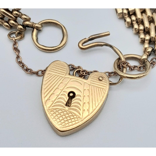 18 - A Beautifully Constructed 9K Yellow Gold Gate Bracelet with Heart Clasp. 18cm. 28.06g weight.