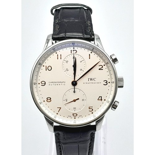 51 - IWC PORTUGUESE CHRONOGRAPH AUTOMATIC WATCH, 40MM CASE, BLACK LEATHER STRAP AND CREAM FACE, GOLD TONE... 