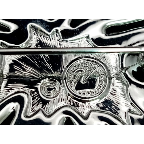 1355 - A Pair of Swarovski Crystal Earrings and a Swarovski Brooch. As new, in original packaging with COA'... 