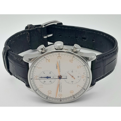 51 - IWC PORTUGUESE CHRONOGRAPH AUTOMATIC WATCH, 40MM CASE, BLACK LEATHER STRAP AND CREAM FACE, GOLD TONE... 