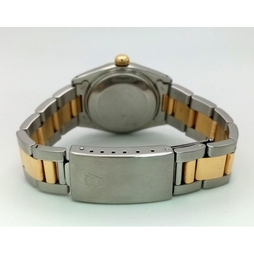 100 - A BI-METAL ROLEX OYSTER PERPETUAL DATEJUST MIDSIZE WATCH. Bi-metal bracelet and case - 31 mm. 18K ye... 