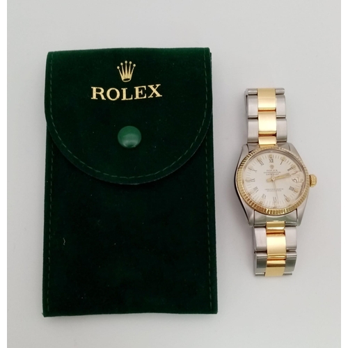 100 - A BI-METAL ROLEX OYSTER PERPETUAL DATEJUST MIDSIZE WATCH. Bi-metal bracelet and case - 31 mm. 18K ye... 