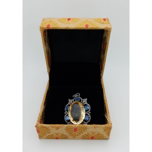 148 - An Oval Citrine Pendant with Kyanites & Rose cut Diamonds. Set in 925 Sterling Silver. Citrine - 31.... 