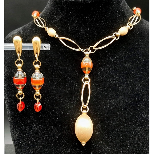 19 - A Gorgeous Italian 18K Yellow Gold and Murano Glass Necklace and Drop Earring Set. Elongated oval ca... 