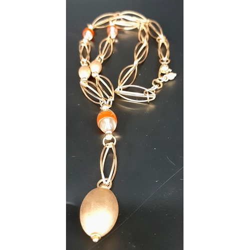 19 - A Gorgeous Italian 18K Yellow Gold and Murano Glass Necklace and Drop Earring Set. Elongated oval ca... 