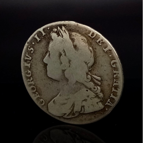 45 - A 1731 George II One Shilling Silver Coin. Roses and plumes. S3698. Please see photos for conditions... 