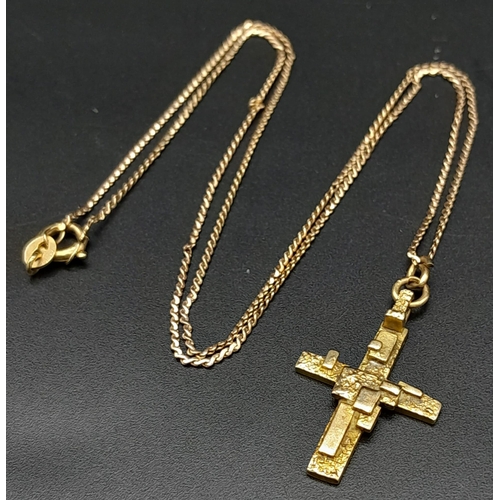 502 - An Abstract 9K Gold Crucifix Pendant on a 9K Yellow Gold Disappearing Necklace. 3cm and 48cm. 5g tot... 