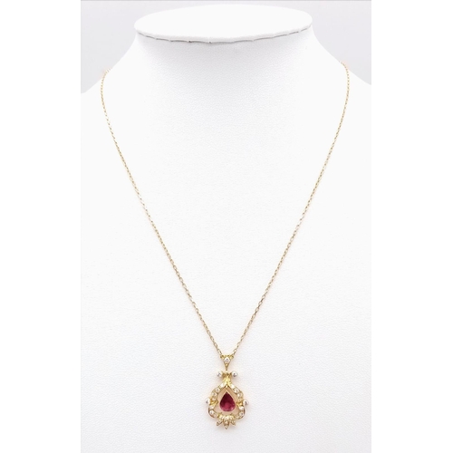 510 - A Fabulous 18K Yellow Gold, Ruby and Diamond Lavaliere Pendant on an 18K Yellow Gold Disappearing Ne... 