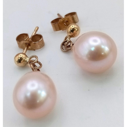 554 - A Pair of 9K Gold Cultured Pink Pearl Teardrop Earrings. 2.4g total weight. As new.