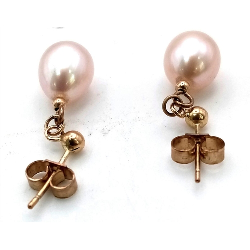 554 - A Pair of 9K Gold Cultured Pink Pearl Teardrop Earrings. 2.4g total weight. As new.