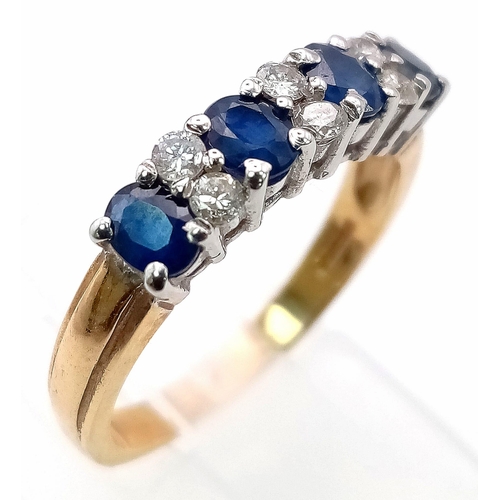 596 - A 9K Yellow Gold Sapphire and Diamond Ring. Four oval sapphires separated by six round cut diamonds.... 