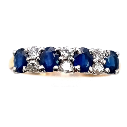 596 - A 9K Yellow Gold Sapphire and Diamond Ring. Four oval sapphires separated by six round cut diamonds.... 