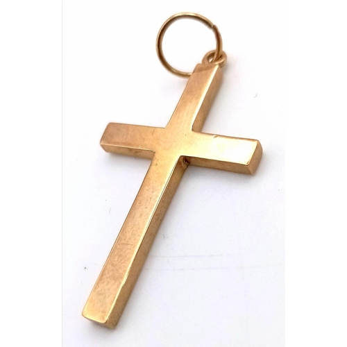 645 - A Solid 9K Yellow Gold Cross Pendant. 4cm x 2cm. 3.85g weight.