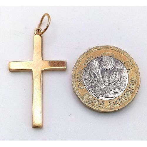 645 - A Solid 9K Yellow Gold Cross Pendant. 4cm x 2cm. 3.85g weight.