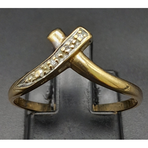 681 - A Vintage 9K Yellow Gold Diamond Crossover Ring. Size P. 1.36g total weight.