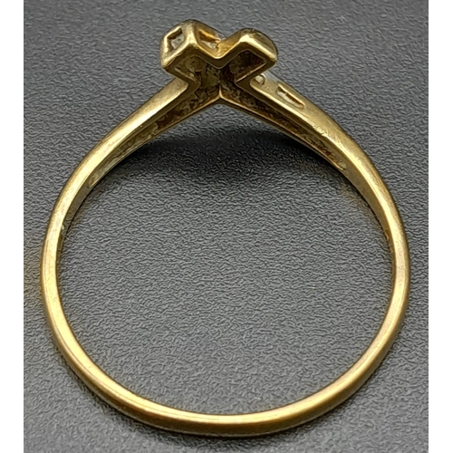 681 - A Vintage 9K Yellow Gold Diamond Crossover Ring. Size P. 1.36g total weight.