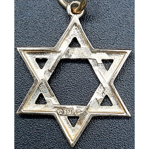 736 - A 9K Yellow Gold Star of David Pendant. 3cm. 1.15g weight.