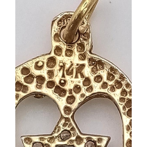 764 - A 9K Yellow Gold and White Stone Star of David Hamsa Pendant. 3cm. 2.15g weight.