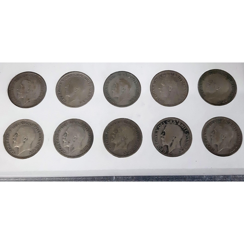 838 - A SET OF 10 SHILLING COINS FROM THE REIGN OF GEORGE V  1927-1936 ENCASED IN PLASTIC DISPLAY TRAY.