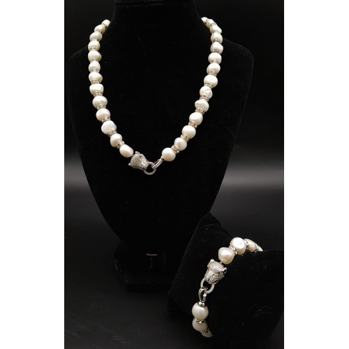 139 - A very elegant, French designer style, natural, cultured, white pearl and cubic zirconia necklace an... 