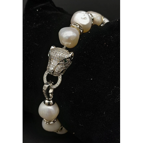 139 - A very elegant, French designer style, natural, cultured, white pearl and cubic zirconia necklace an... 