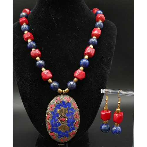 237 - A fashionable, Nepalese, ethnic, necklace and earrings set with lapis lazuli and red coral. Necklace... 