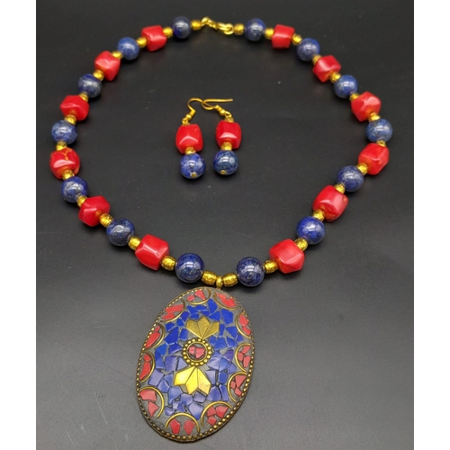 237 - A fashionable, Nepalese, ethnic, necklace and earrings set with lapis lazuli and red coral. Necklace... 