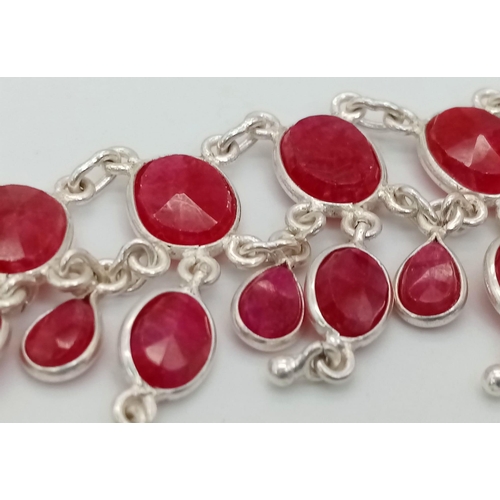 407 - A Ruby Gemstone Choker Necklace set in 925 Silver. Two rows of oval cut rubies. 38.58g total weight.... 