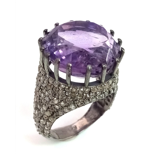 94 - An Electrifying 17ct Amethyst with 2.20ct of Diamond Accents Ring. A beautiful round cut amethyst wi... 