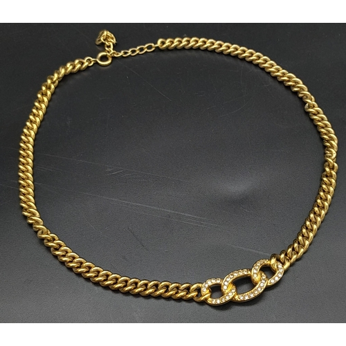 551 - A Christian Dior Designer Gilded Choker Necklace with White Stone Accents. 38cm. Ref: 14061