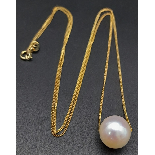 561 - A 9K Yellow Gold Disappearing Necklace with a Floating Round White Cultured Pearl. 44cm. 2.65g total... 