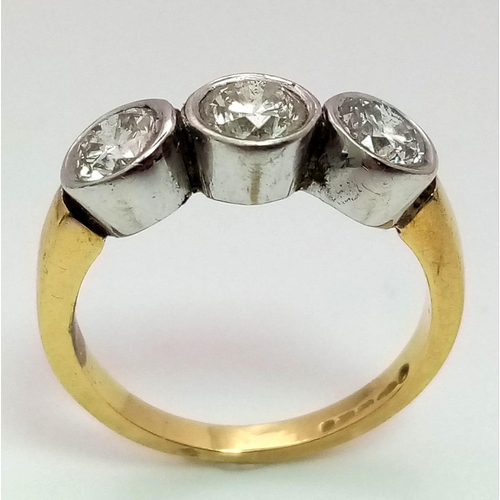 570 - An 18K Yellow Gold Diamond Trilogy Ring. Three brilliant round cut diamonds. 1.3ctw approx. Size M. ... 