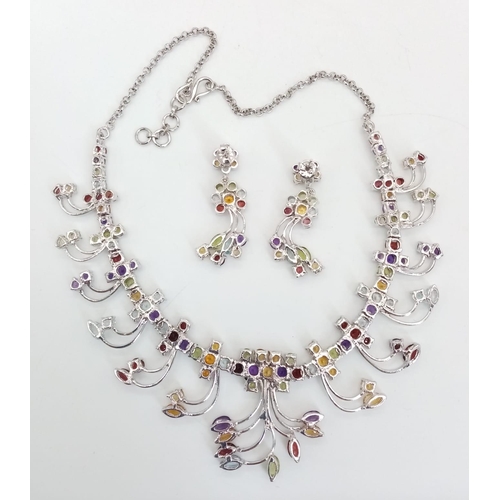 587 - A Multi-Colour Gemstone Necklace & Drop Earring Set. A kaleidoscope of rubies, citrine, topaz, ameth... 