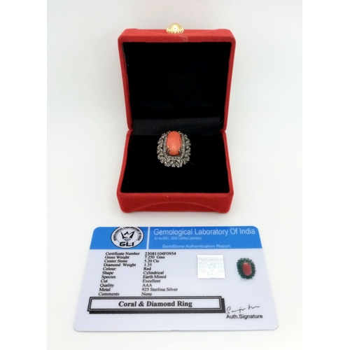 76 - A 5.20ct Red Coral Ring with 1.35ct of Diamond Accents. Set in 925 Silver. Size L. Comes with a GLI ... 