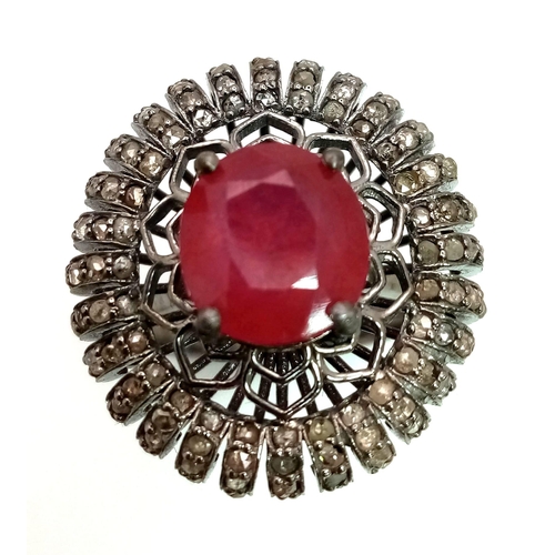 766 - An Art Deco Style 5.90ct Ruby Ring with 1.60ct of Diamond Accents. Set in 925 silver. Size P. Comes ... 