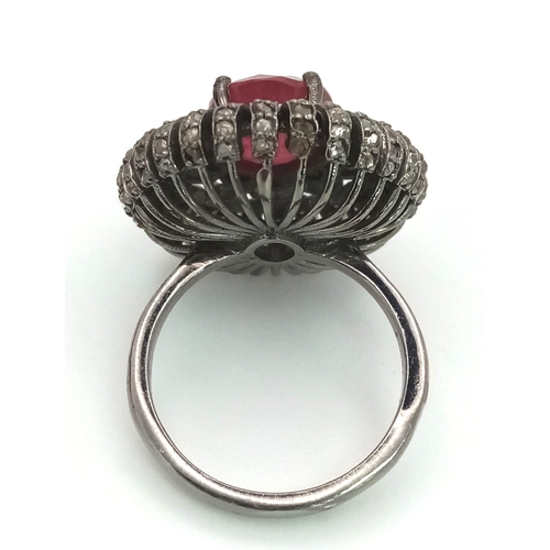 766 - An Art Deco Style 5.90ct Ruby Ring with 1.60ct of Diamond Accents. Set in 925 silver. Size P. Comes ... 